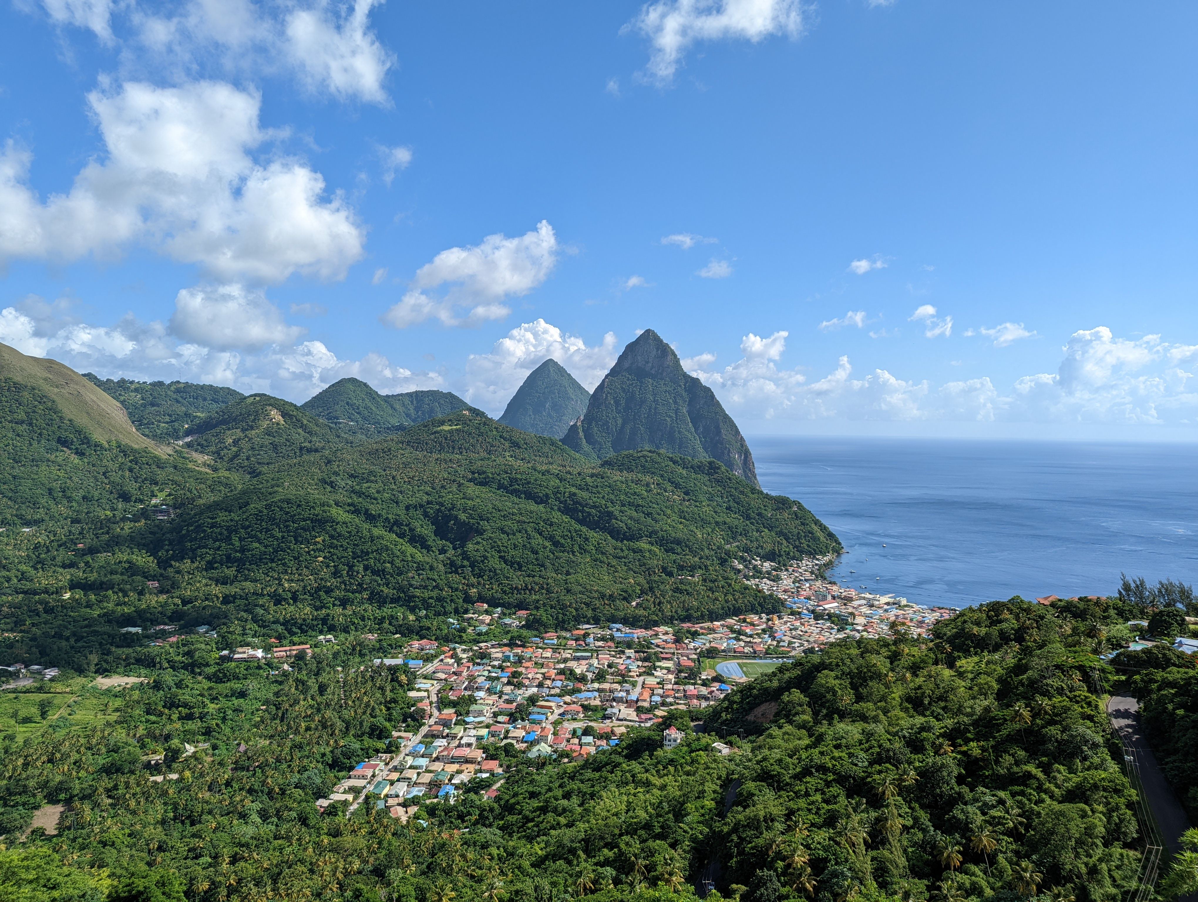 The iconic Pitons rising from turquoise waters of St. Lucia