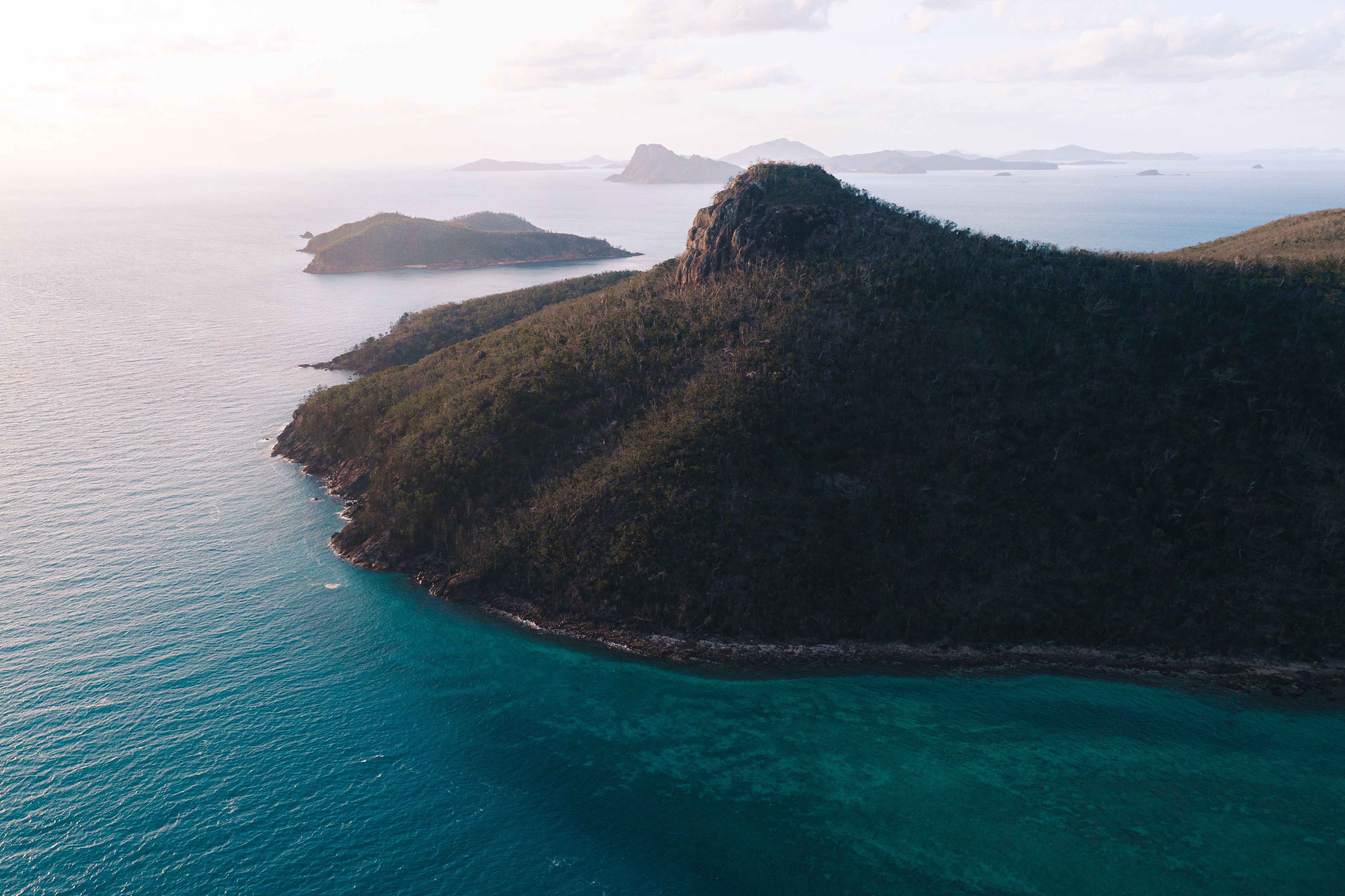 Pristine white sand beaches and turquoise waters of the Whitsunday Islands